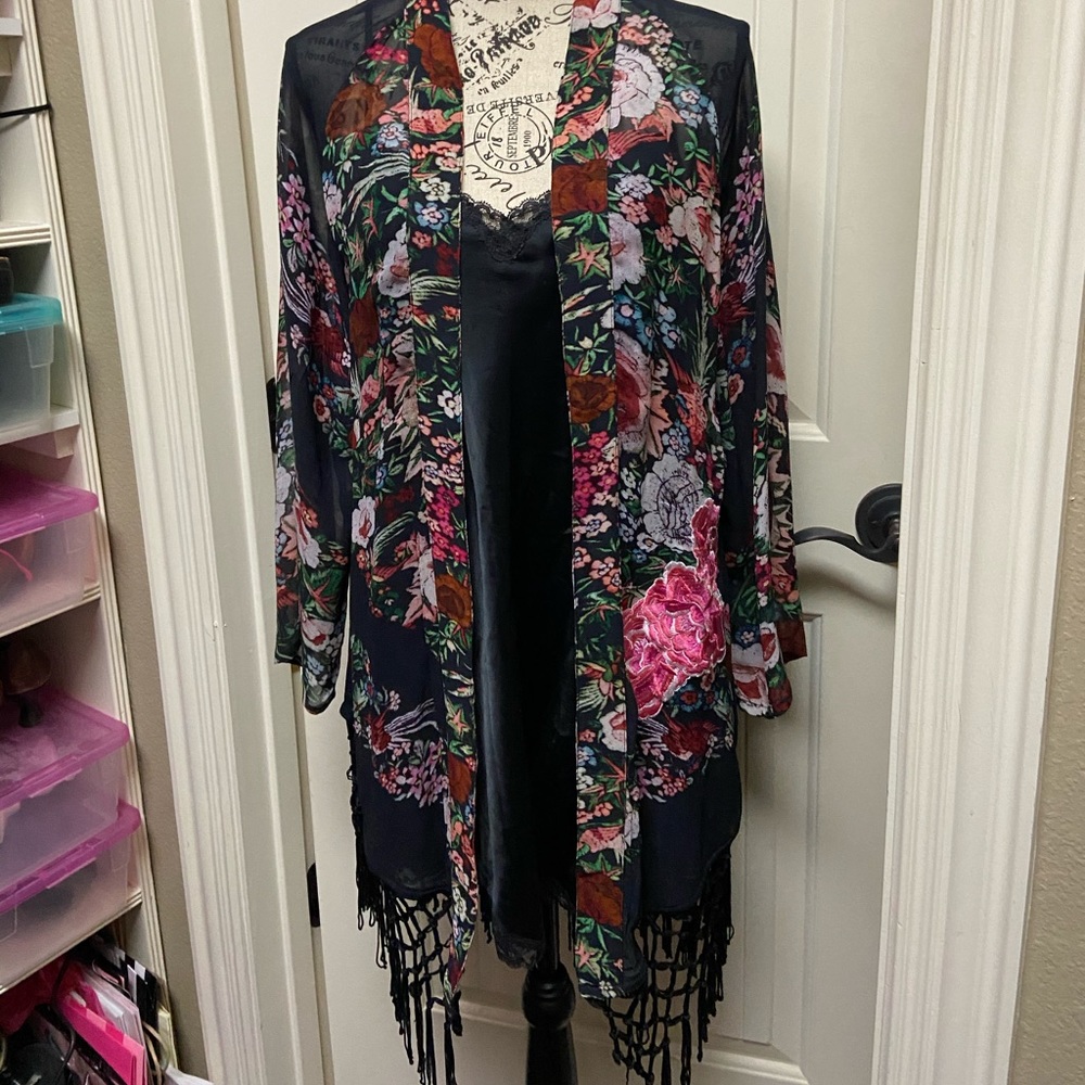 Dressy black wrap or coverup.
